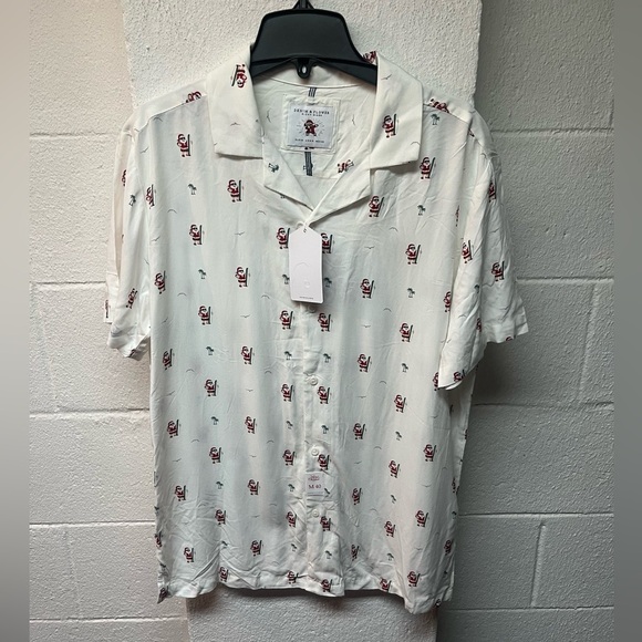 Denim and Flower Christmas Shirt.
Santa lifeguard, surfboard - Picture 1 of 5